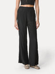 Flared trousers in satin - black