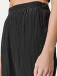 Flared trousers in satin - black